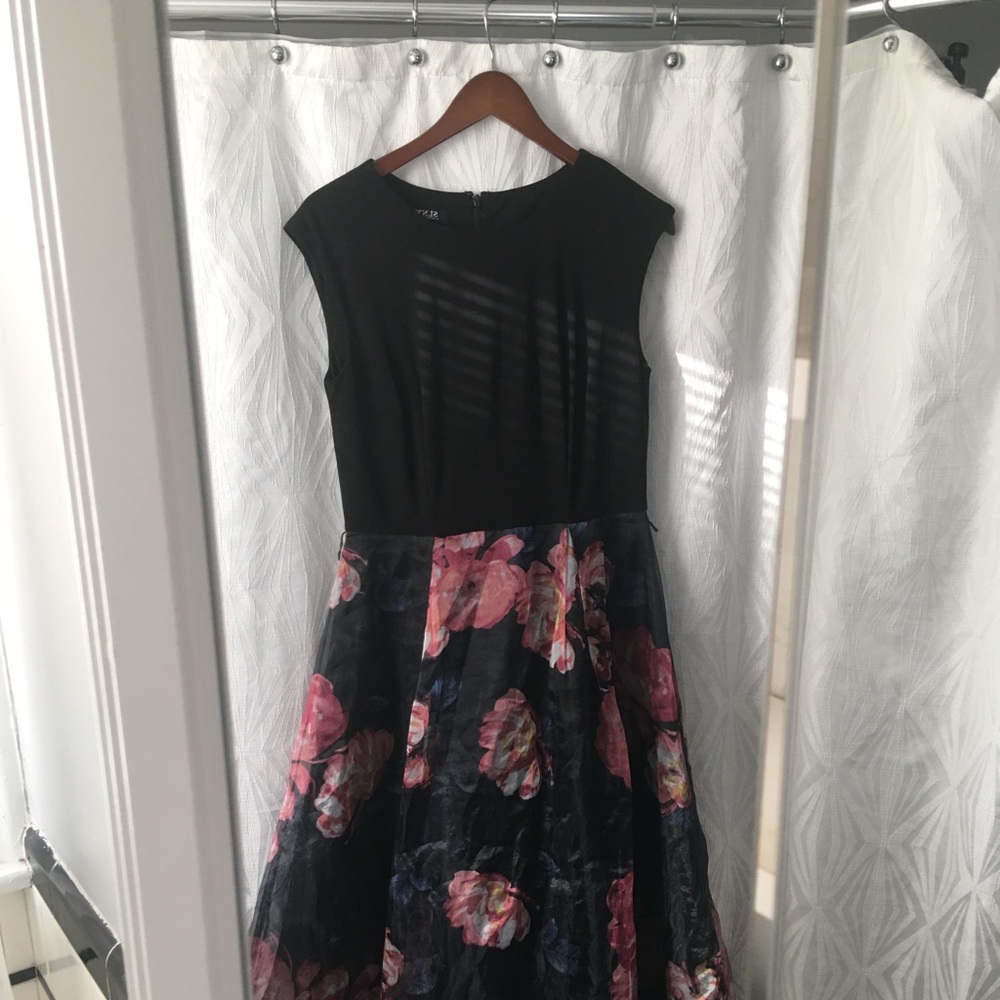 Sleeveless black and floral gown